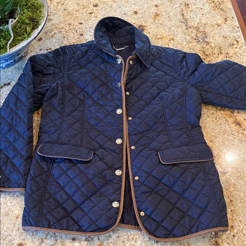 Chico's navy blue quilted jacket with brown trim and gold-tone buttons